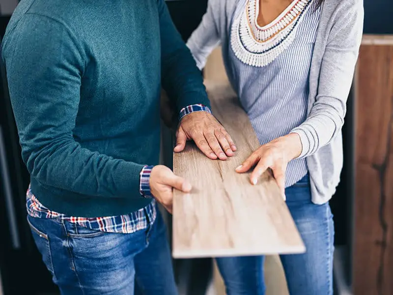 Couple Choosing Floor Laminate