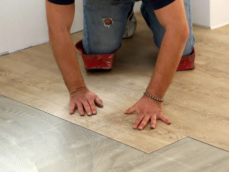 Laying Flooring Worker Install