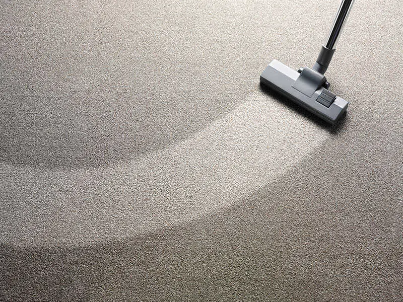 Vacuum Cleaner On Carpet