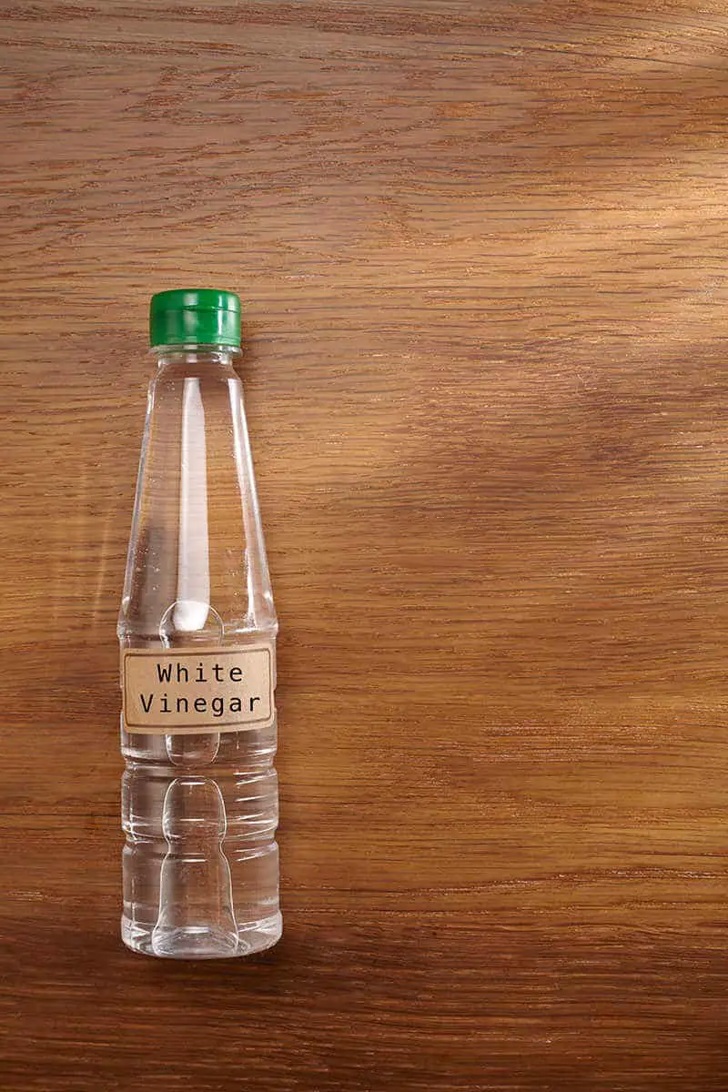 White Vinegar On Wooden